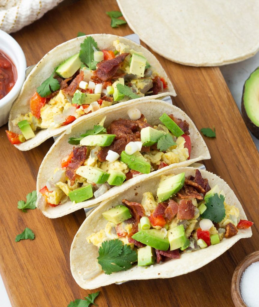 Three breakfast tacos in a row