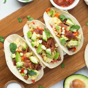 Three breakfast tacos in a row