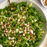 A large serving bowl of Chick Fil A Kale Crunch Salad.