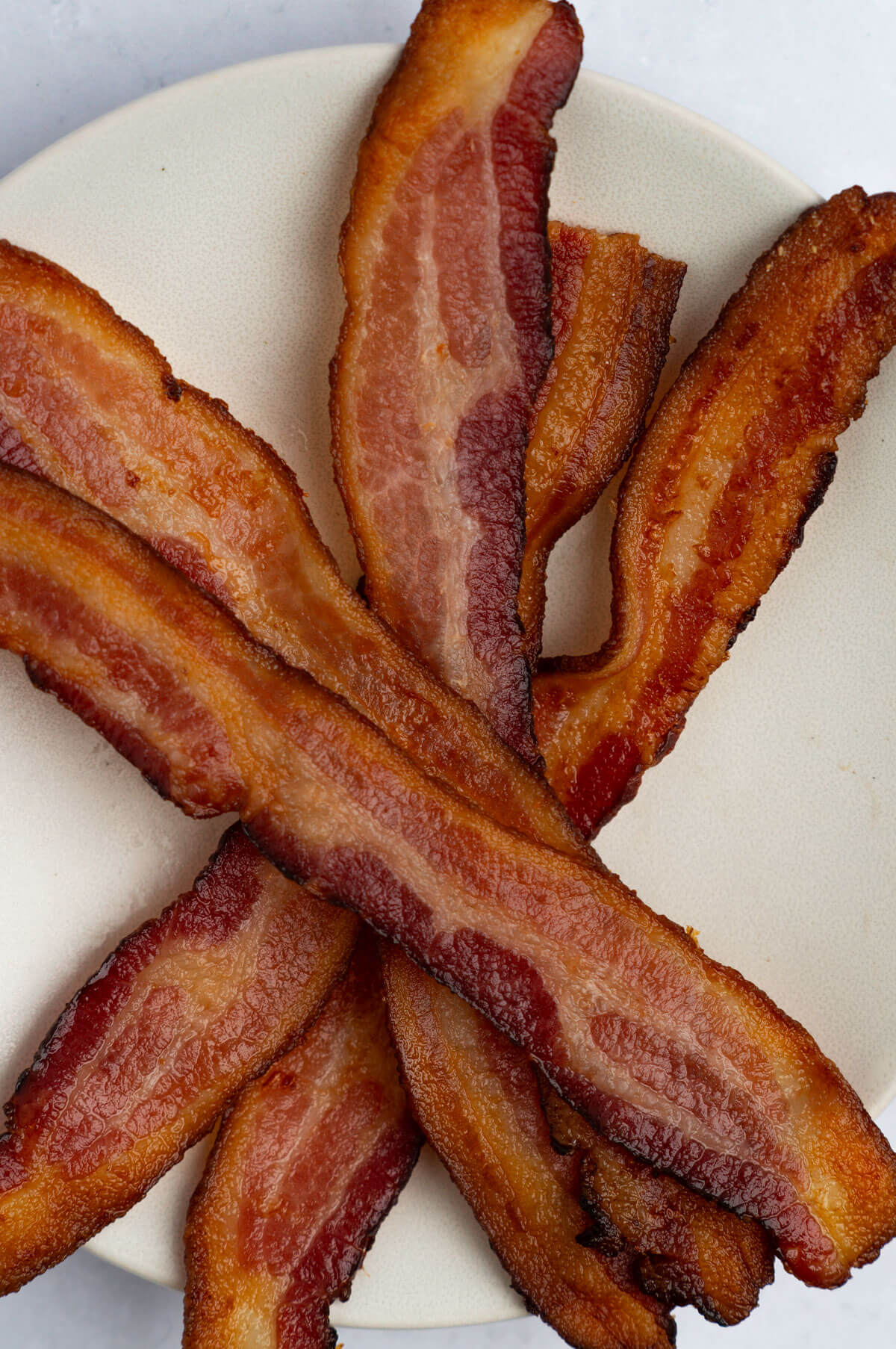 Plate of bacon overlapping.