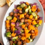 Dish of chicken sausage sheet pan dinner.