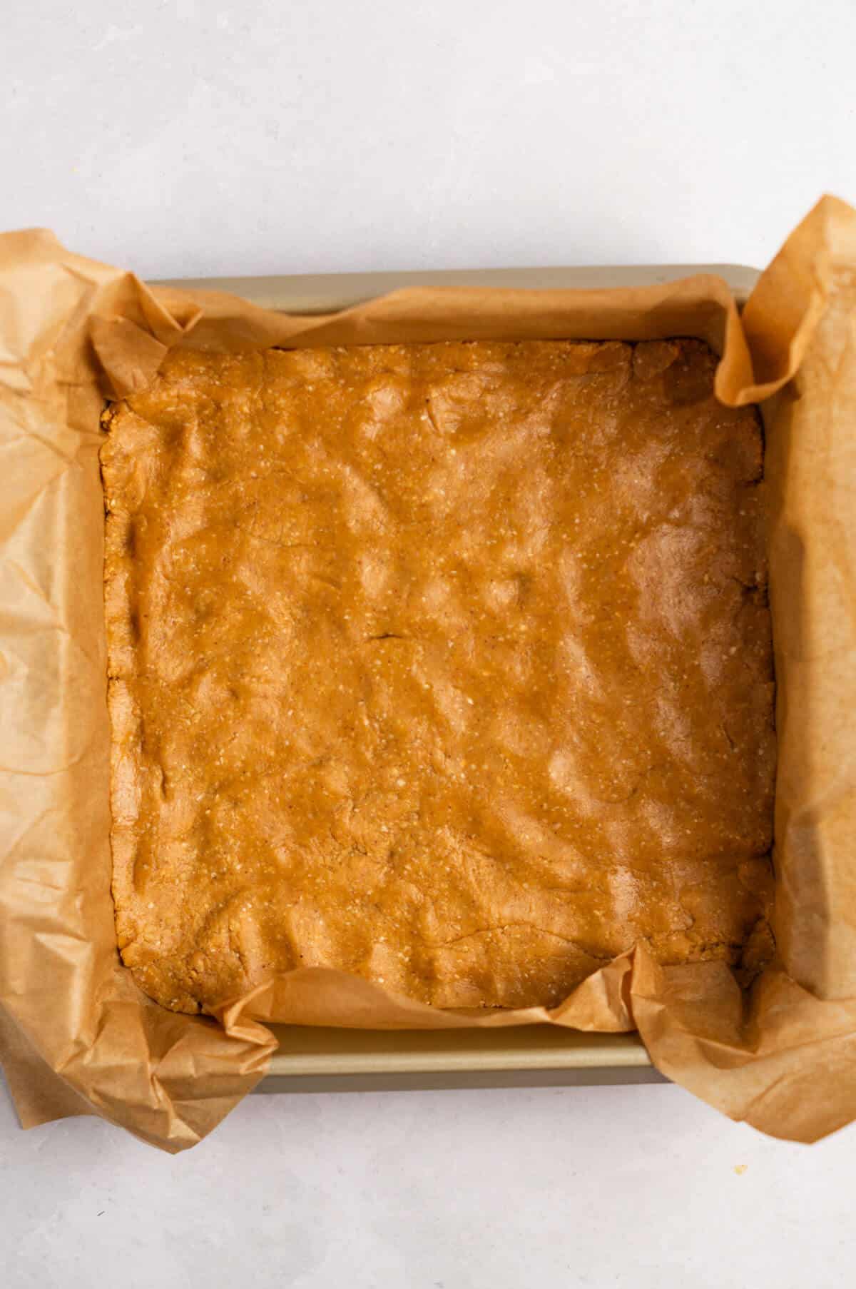 Pan of peanut butter oat layer.