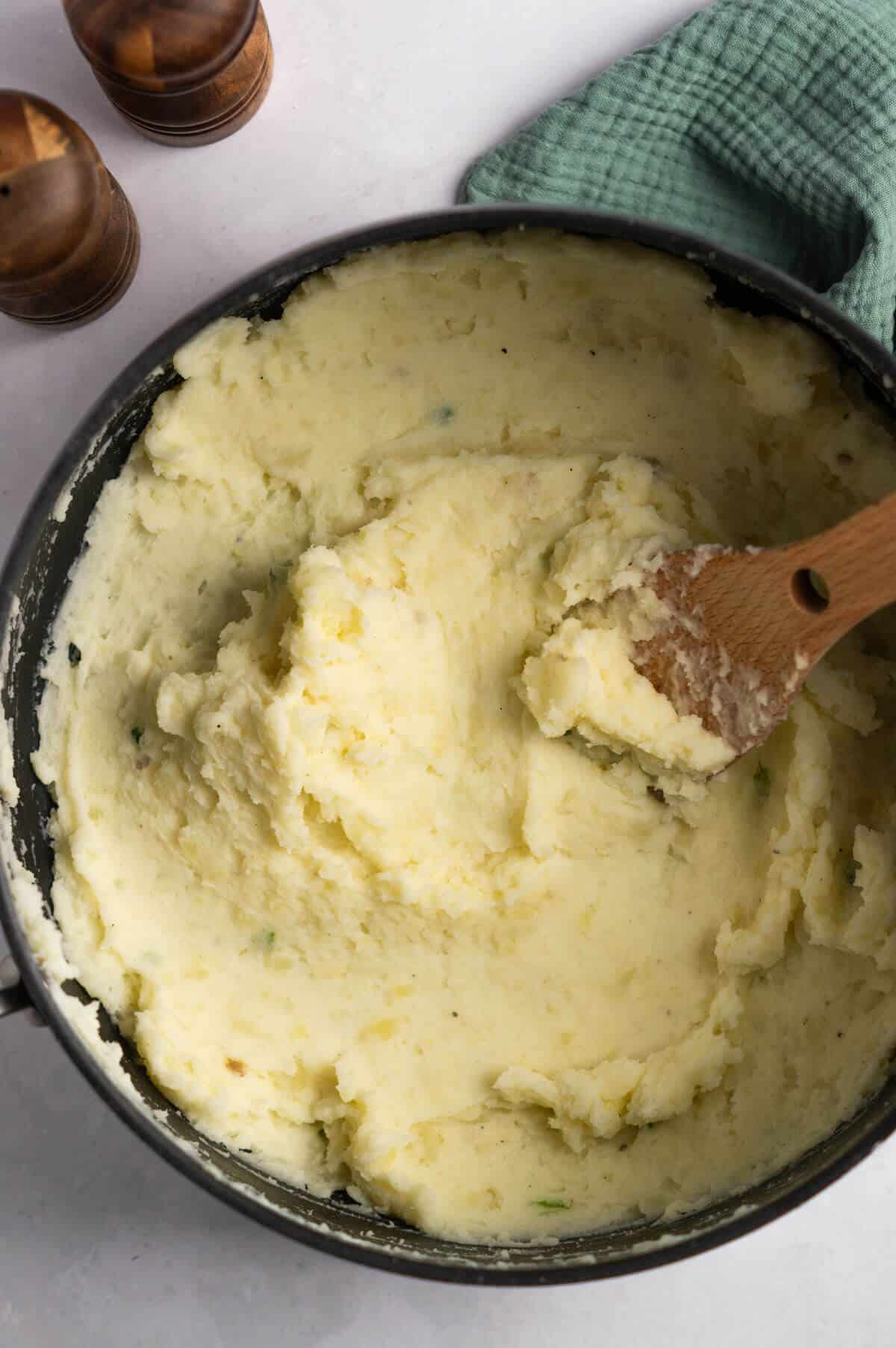 A large pot with creamy Greek yogurt mashed potatoes.