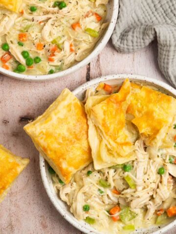 Two bowls of deconstructed chicken pot pie.