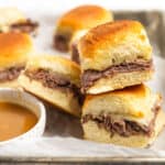 A stack of Hawaiian roll roast beef sliders.