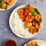 Three bowls of honey sriracha shrimp over white jasmine rice.