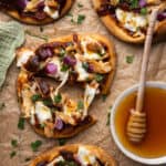 Overhead shot of 4 bbq chicken flatbreads.