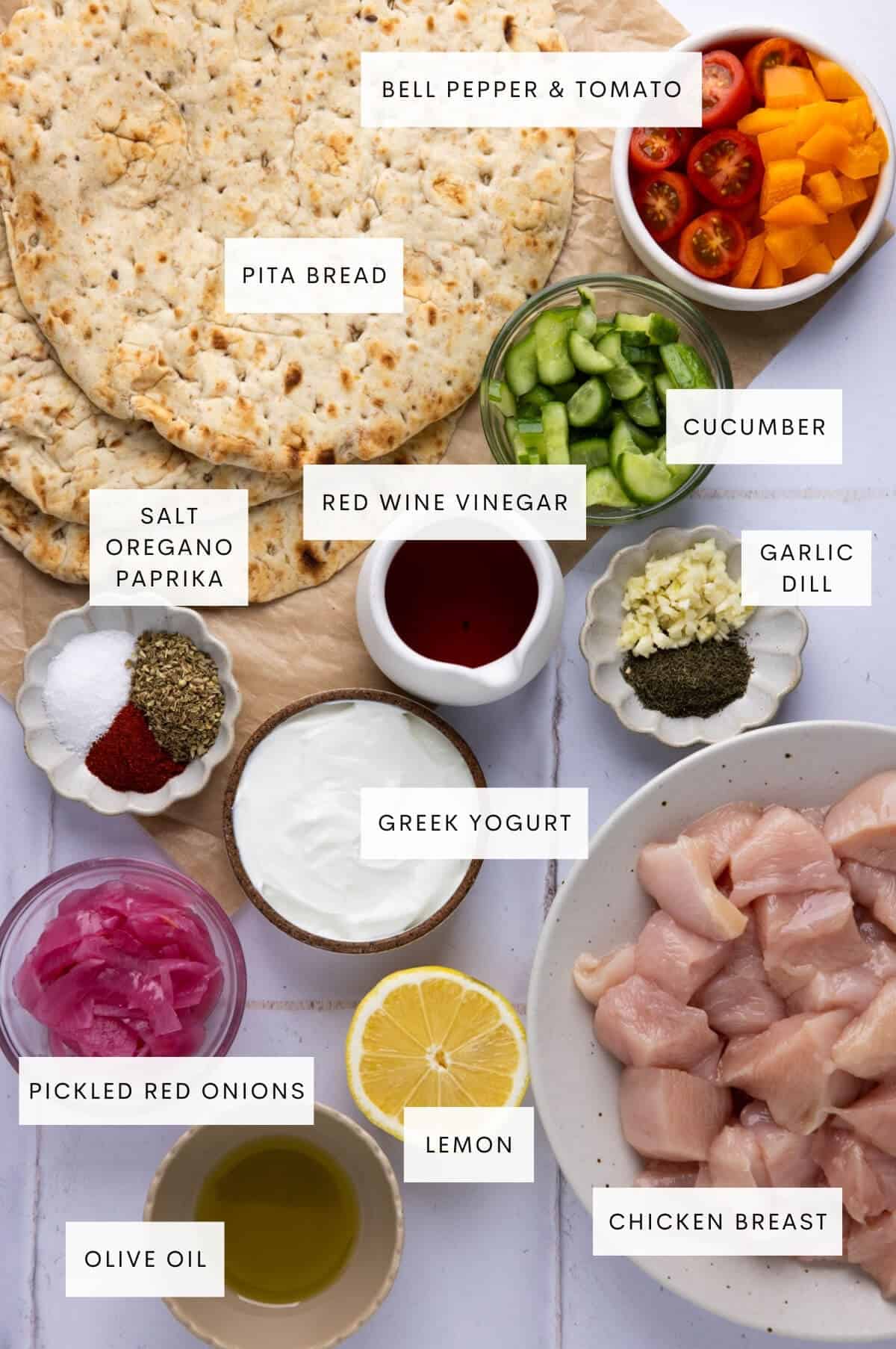 Ingredients needed for Greek chicken wraps.