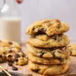 A stack of four coconut caramel cookies.