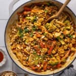 An overhead shot of a large pot of peanut chicken stir fry.