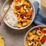 Two pineapple chicken rice bowls.