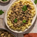 Ground beef stroganoff over noodles.