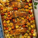 A sheet pan with honey mustard salmon.