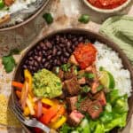 Overhead shot of a steak and rice bowl.