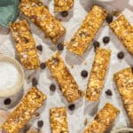 Energy bars scattered across a piece of parchment paper.