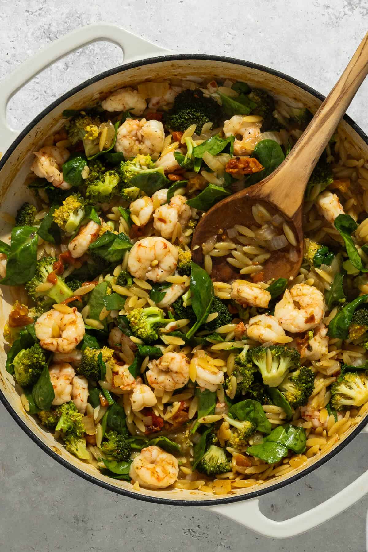 Complete shrimp orzo skillet.