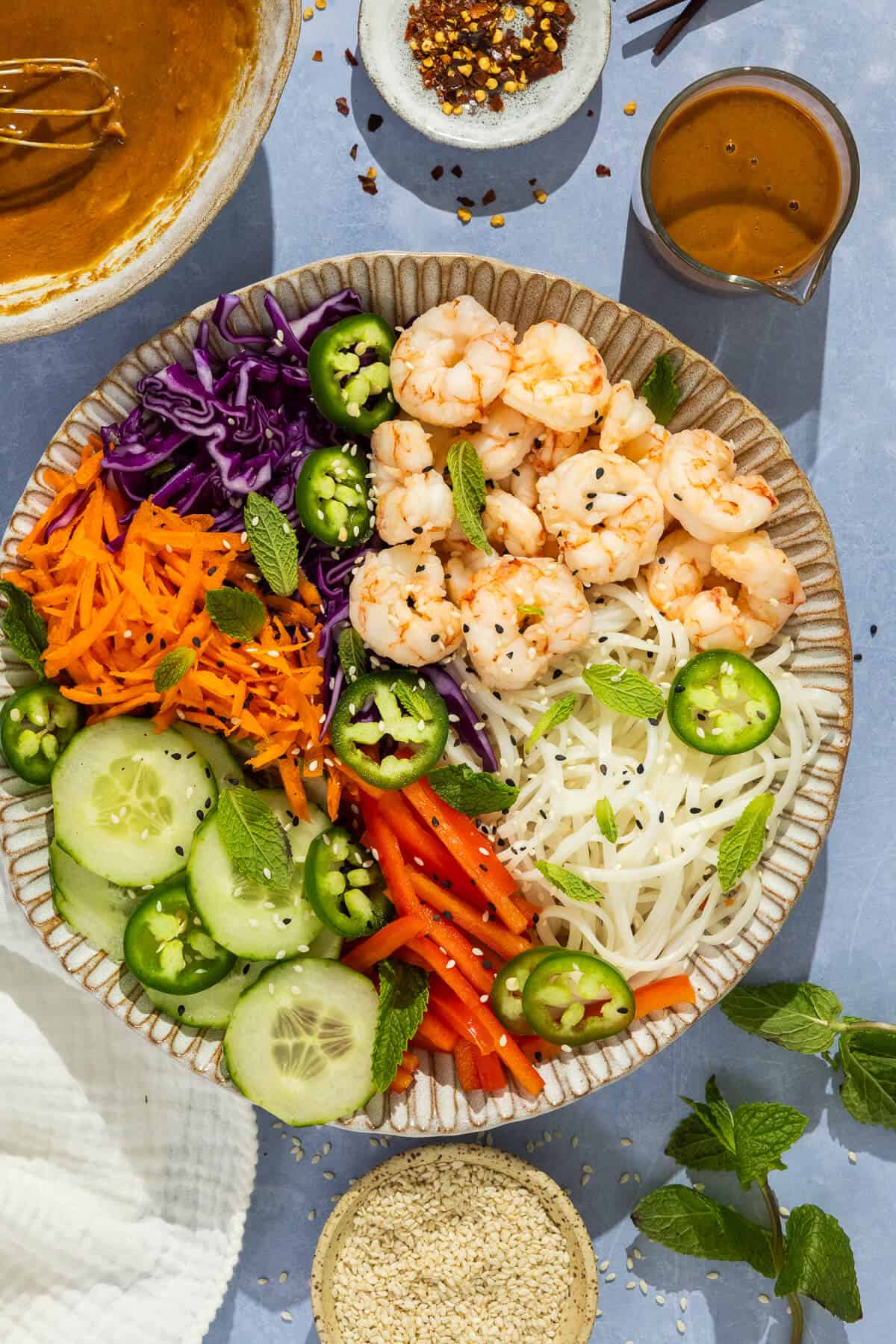 Plated spring roll in a bowl.