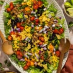 Large serving dish of plated chopped taco salad.