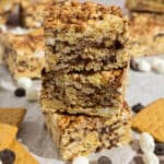 Three s'mores Rice Krispies squares stacked on top of each other.