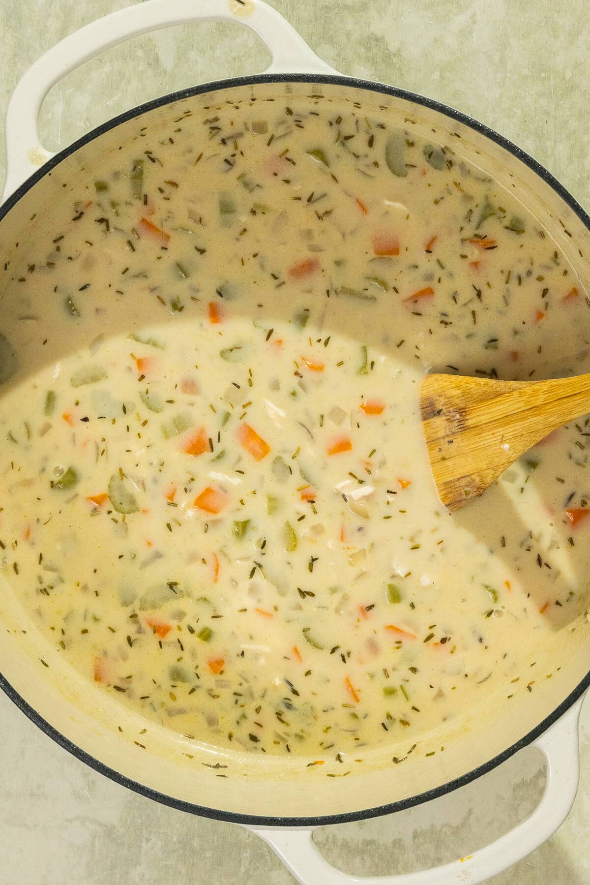 The completed creamy chicken and wild rice soup all combined together.