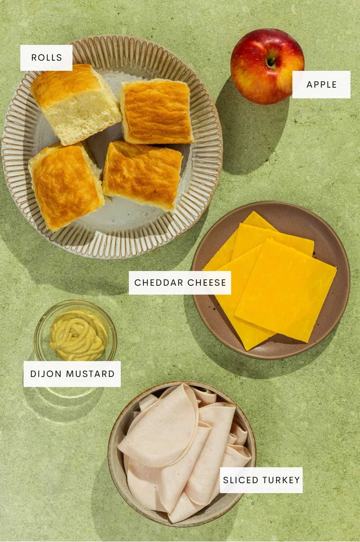 Ingredient shot for turkey sliders with apple and cheddar.