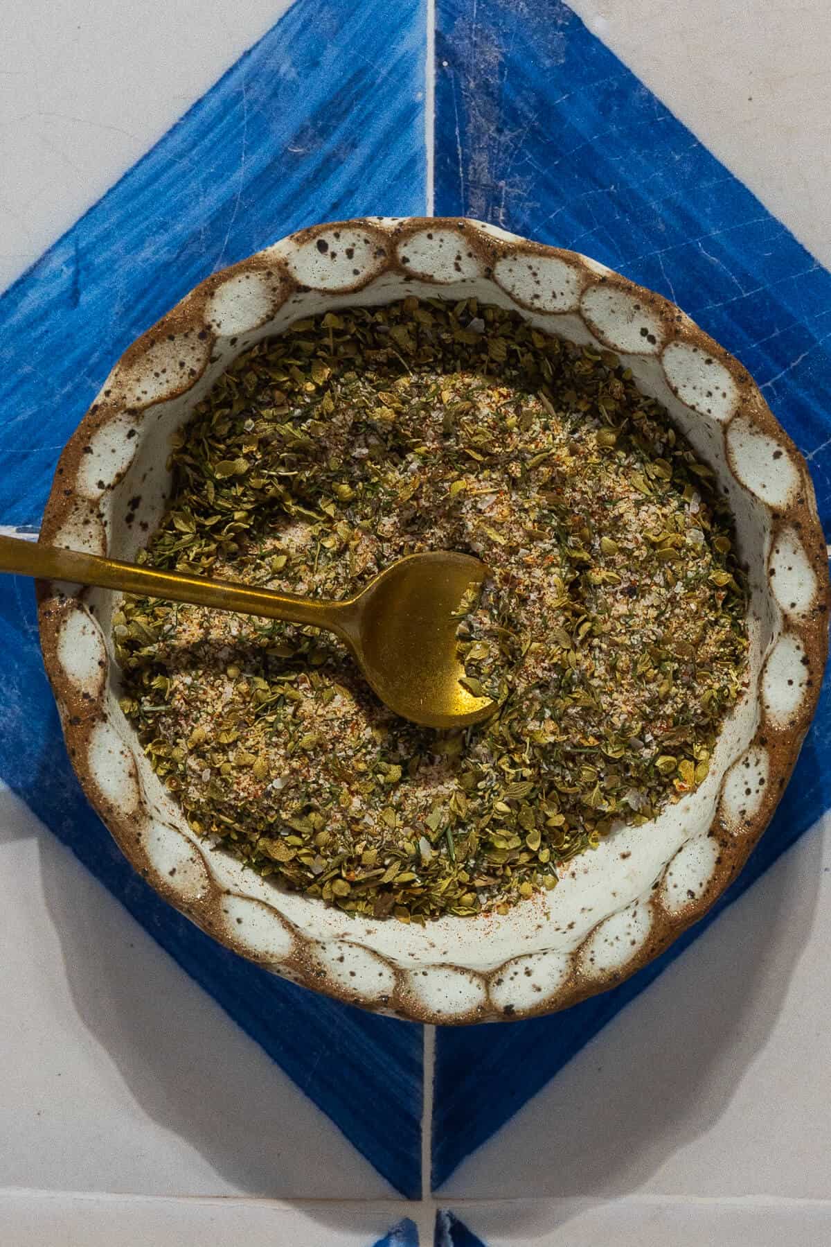 A small bowl with the combined spices.