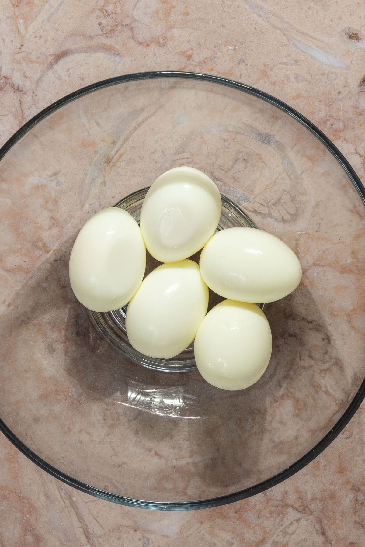 A bowl of hard boiled eggs.