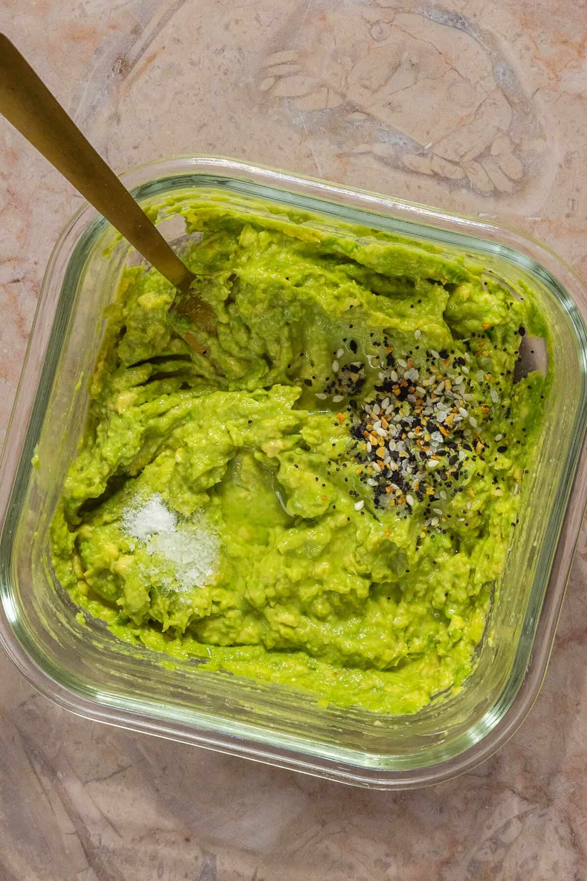 Mashed avocado with salt and everything but the bagel seasoning.