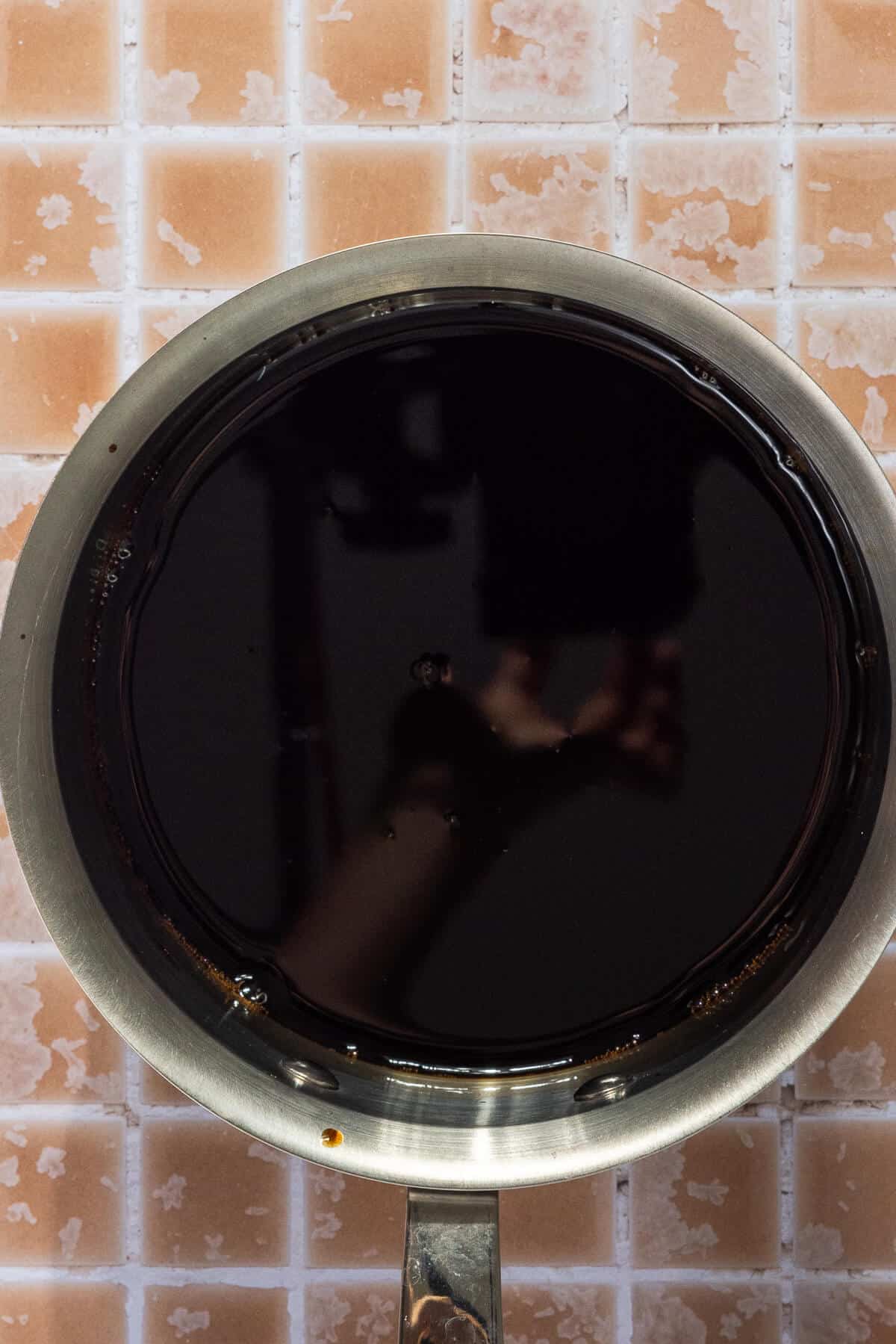 A saucepan with balsamic glaze.