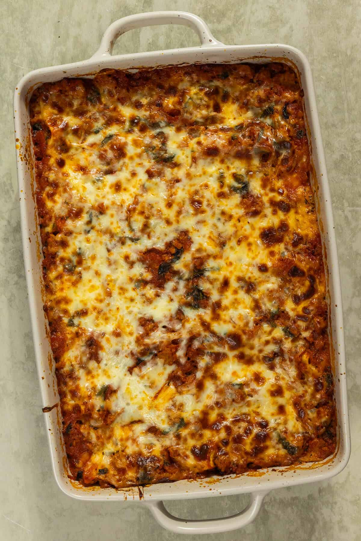 A baking dish of baked lasagna.