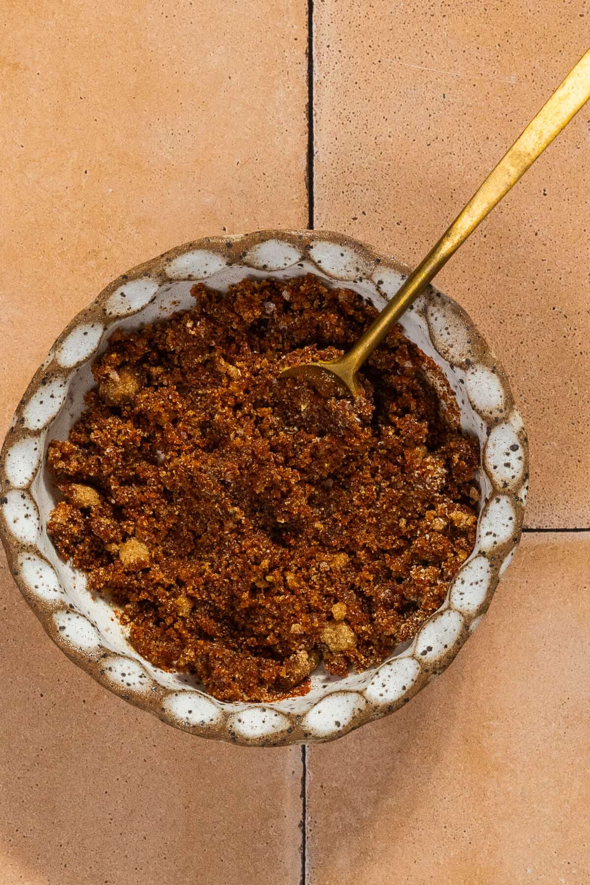 A small bowl with the seasonings for the salmon.