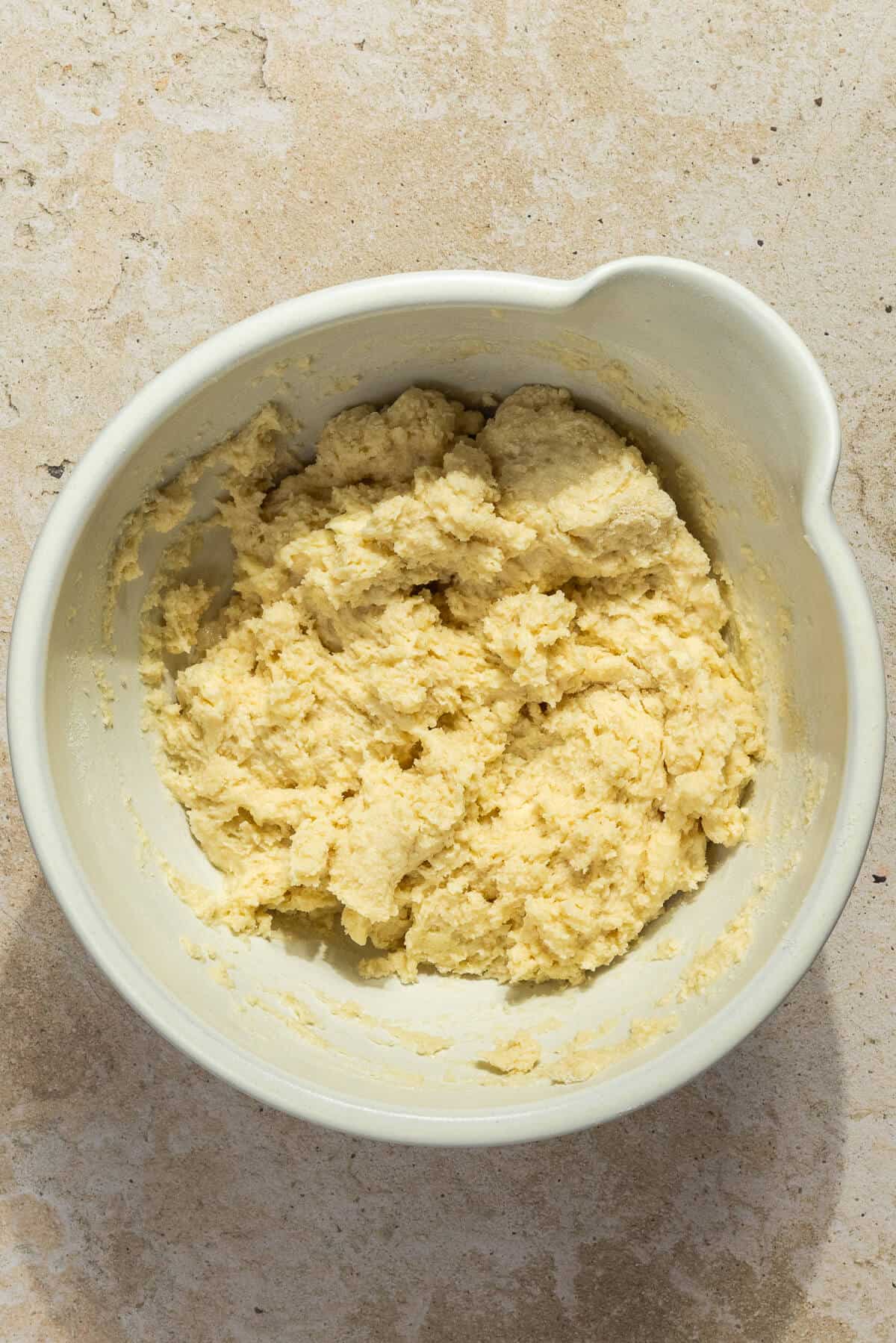A mixing bowl with the dough for the strawberry shortcakes.