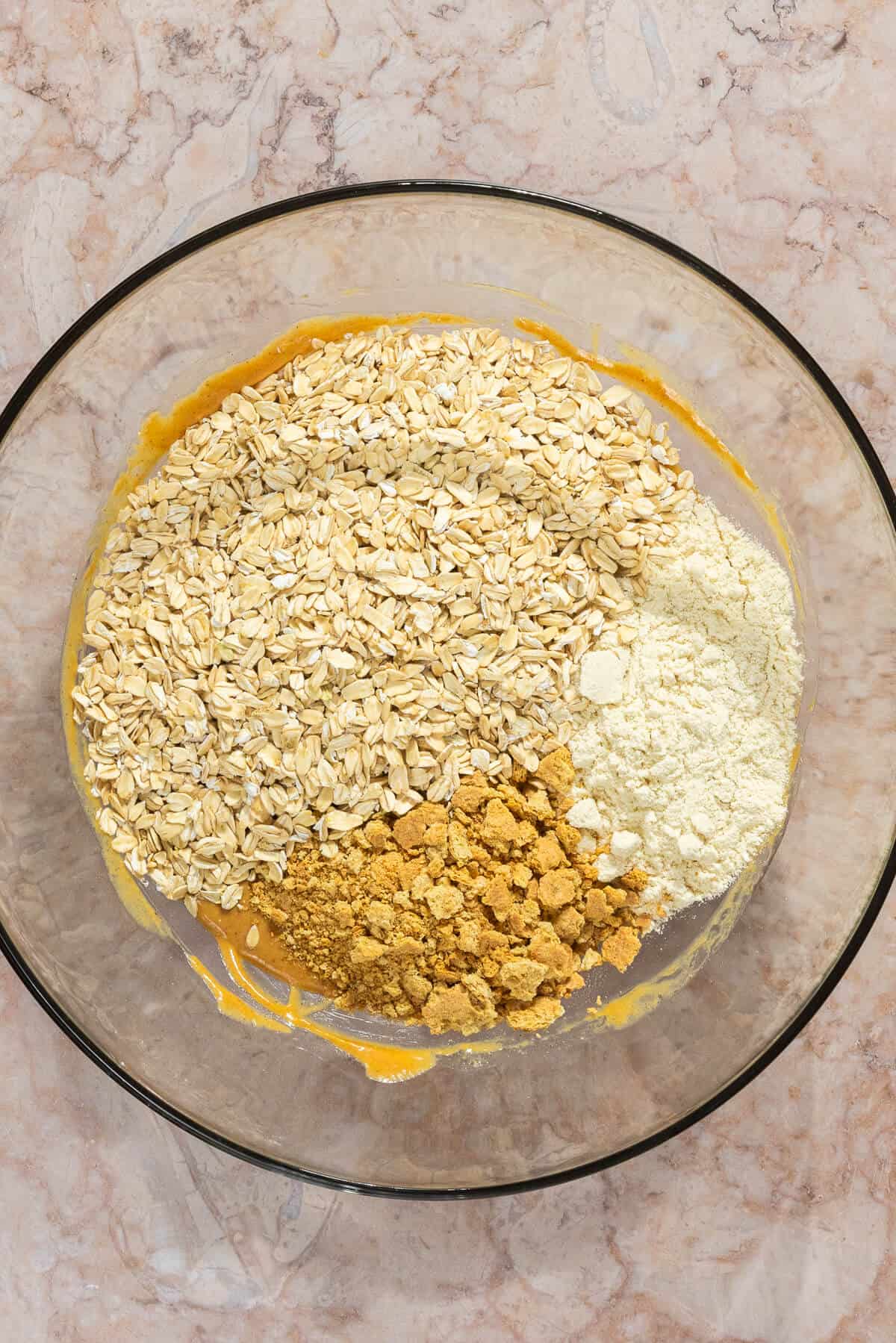 Dry ingredients added to the wet ingredients for the s'mores protein bites.