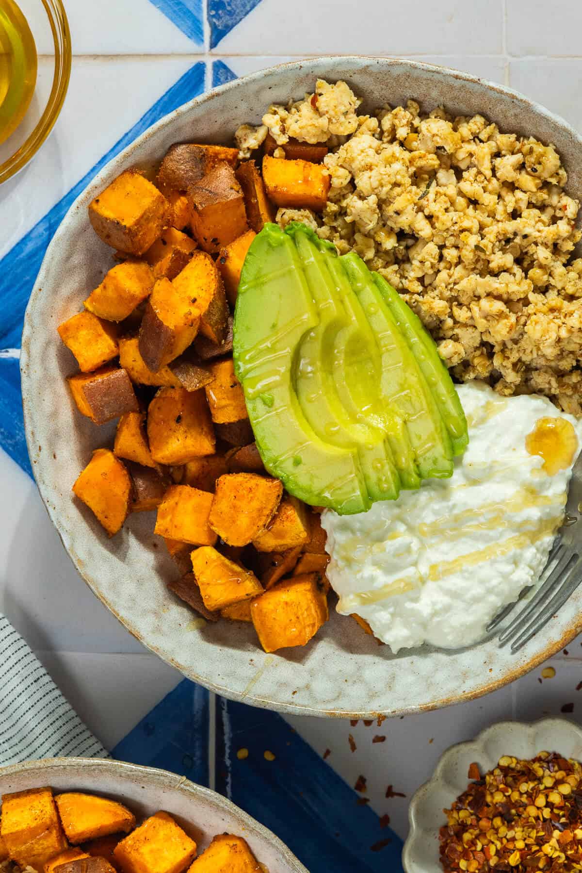 An assembled hot honey breakfast bowl.