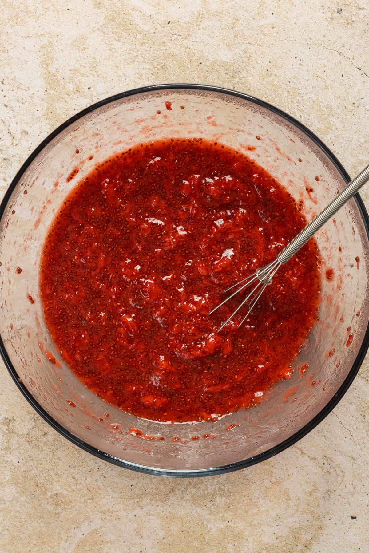 Bowl of strawberry chia jam.