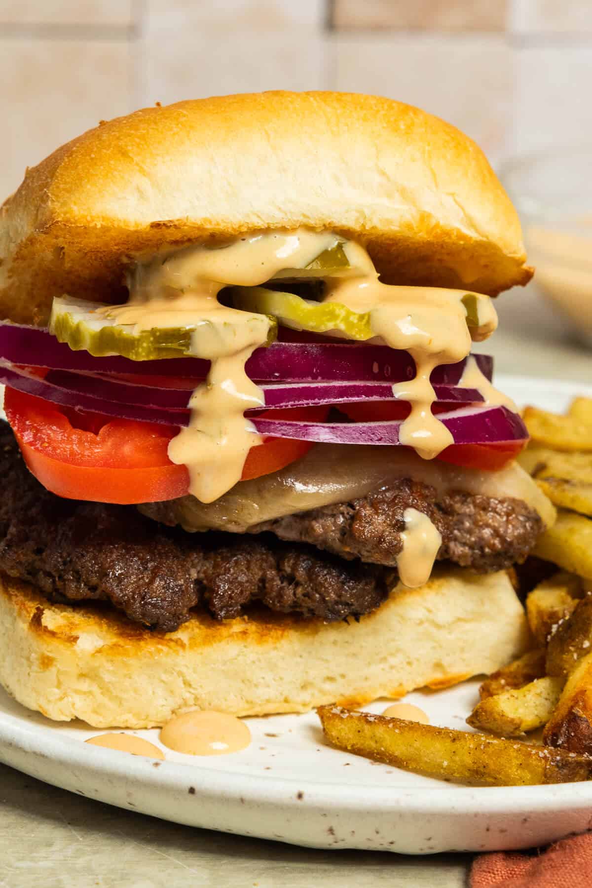 An up close shot of a homemade smashburger.