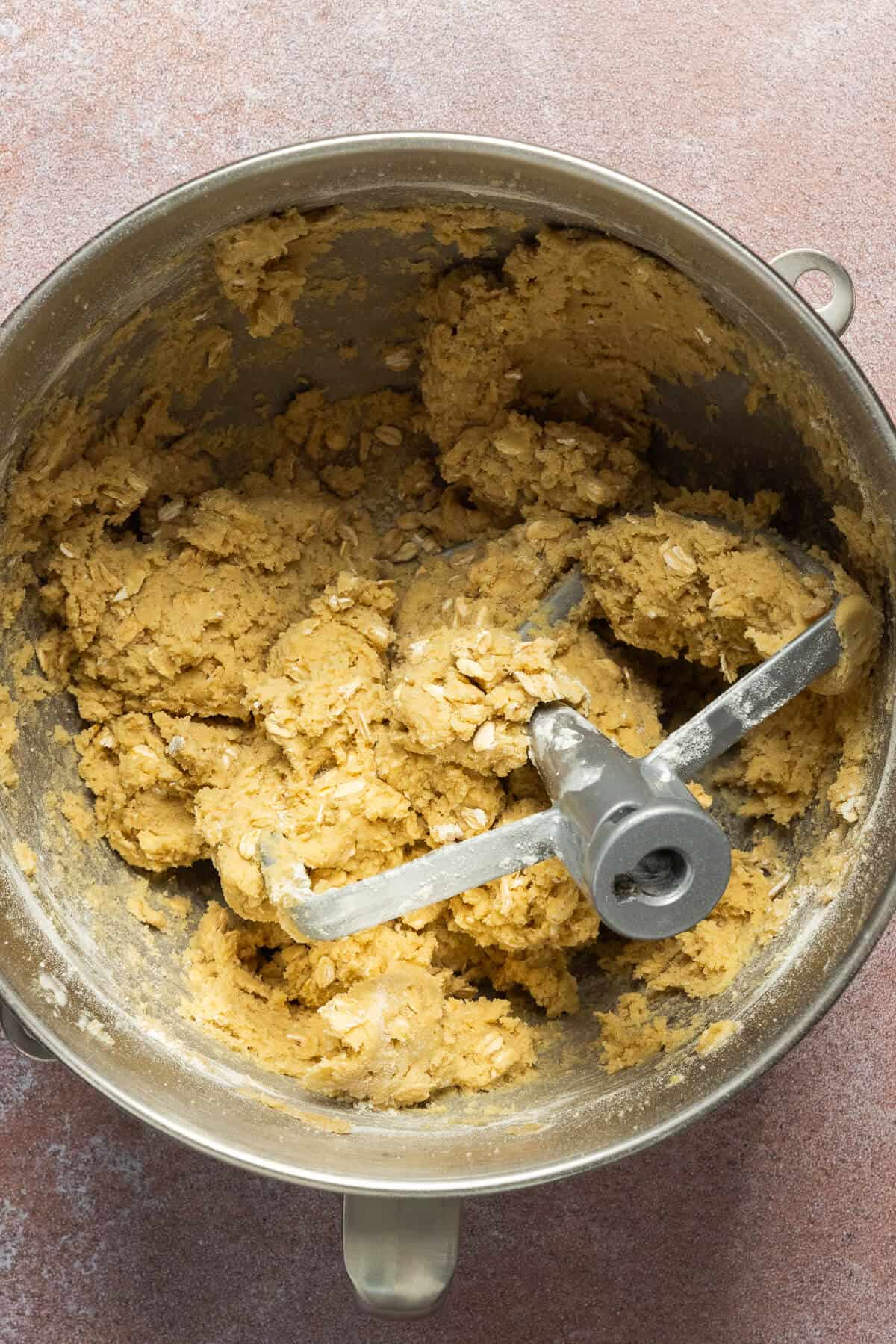 The wet and dry ingredients combined in the kitchenmaid mixing bowl.