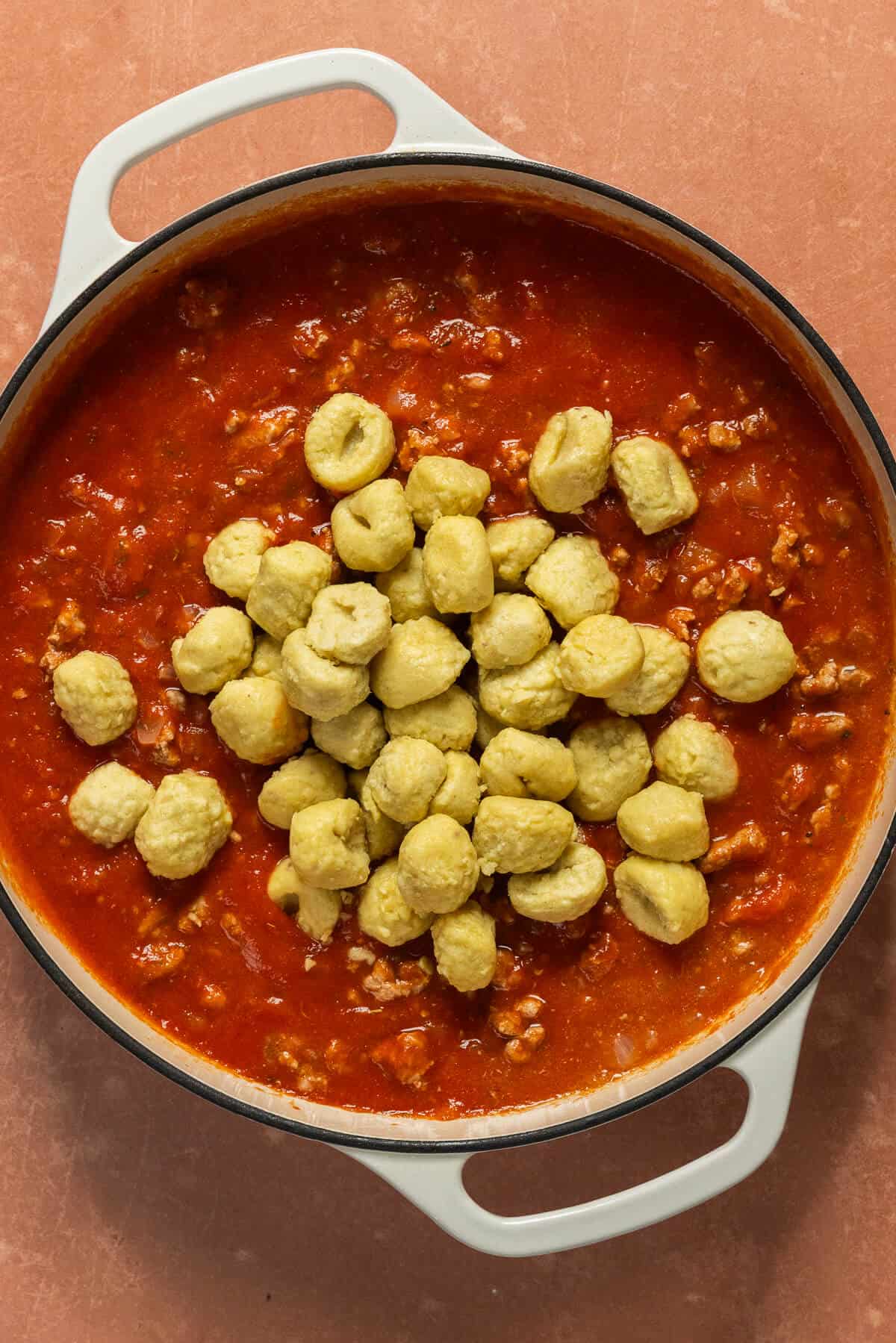 Gnocchi added to the skillet for the one pan gnocchi.