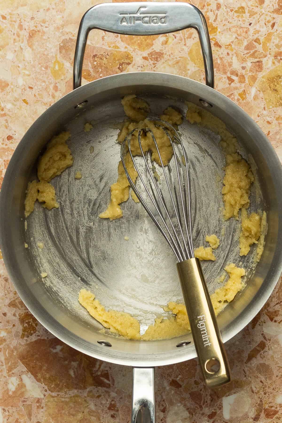 A large skillet with a roux.